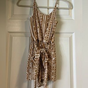 White and light brown patterned sundress from onetheland.